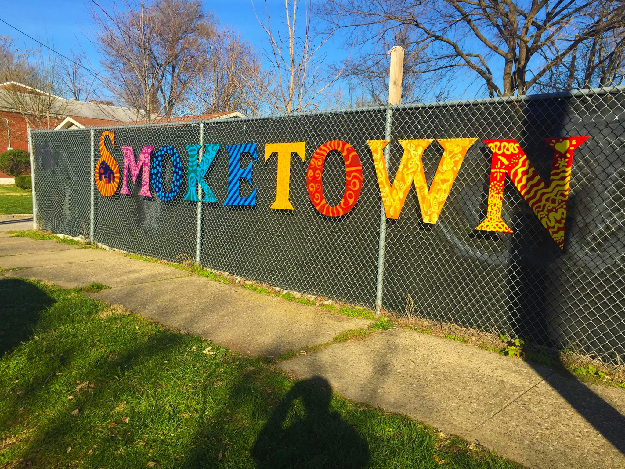 Smoketown sign on fence